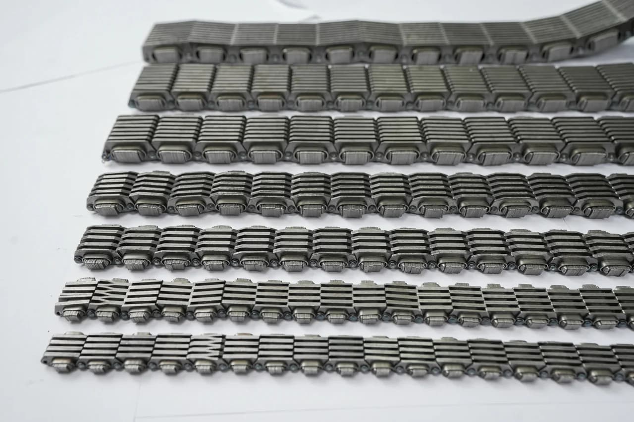 Several P.I.V. variable-speed chains arranged by visible size